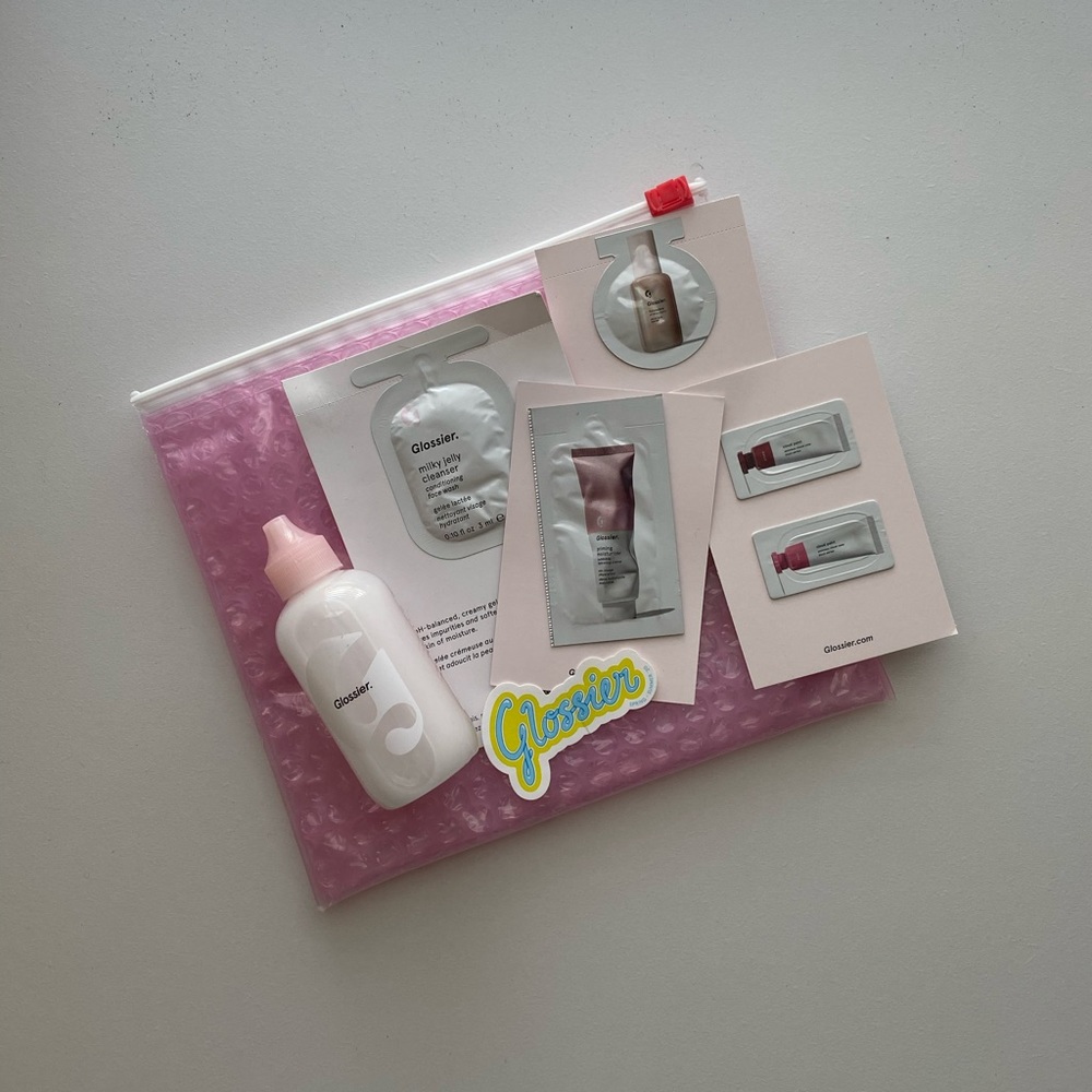 Glossier Milky Oil with other Glossier things